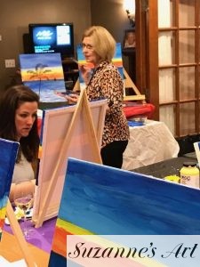 Suzanne Foxwell presenting at a painting party