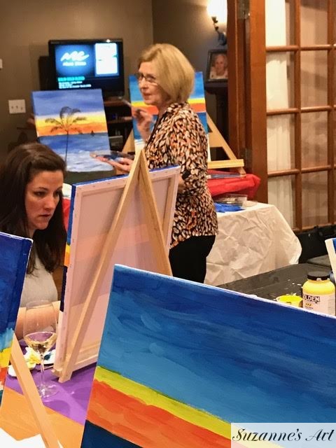 Suzanne Foxwell presenting at a painting party